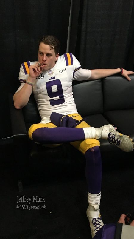 Joe Burrow smokes a cigar after defeating Clemson in the national championship game in 2020.