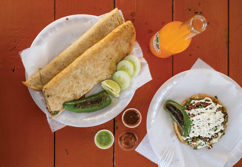 Steak machete, a bottle of mandarin Jarritos and sope al pastor from Pachucos Taqueria on Lockbourne Road