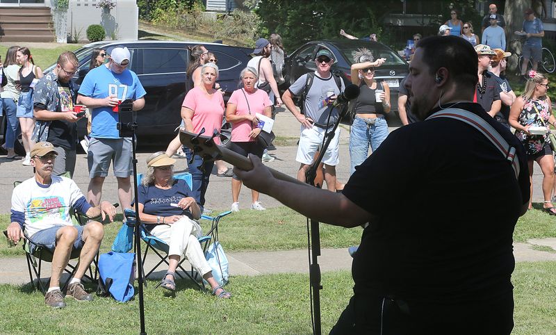 Josh Ison of Toby Danger plays to the Dodge Avenue crowd during the annual Porch Rokr Festival on Saturday, August 19, 2023 in Akron, Ohio. [Phil Masturzo/ Beacon Journal]