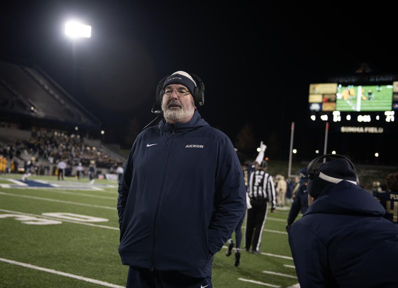 University of Akron football coach Joe Moorhead takes in the scene with five seconds left on the clock in a Zips victory over Kent State on Nov. 1, 2023.