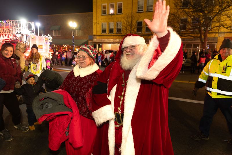 Santa and Mrs. Claus greet spectators during the 2023 Ravenna Holiday Celebration in the city's downtown. This year's event will be Nov. 28.