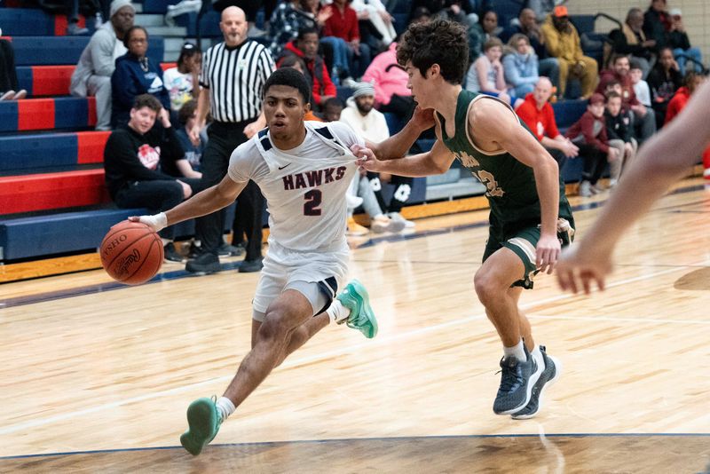 Dec 20, 2023; Columbus, Ohio, USA;
Hartley's Jakhi Calloway (2) dribbles down the court against Dublin Jerome's Cooper Craig (4) during their game on Wednesday, Dec. 20, 2023 at Hartley High School.