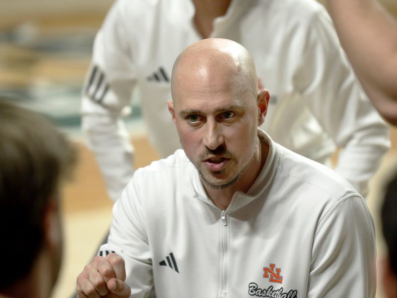 Head coach Jeremy Duerr talks basketball during New Lexington's 43-40 win against top-seeded Marietta during a Division II district semifinal on March 4, 2024, at the Ohio University Convocation Center in Athens. Duerr has resigned after leading the Panthers to 127 win in 10 years — 87 since 2020.