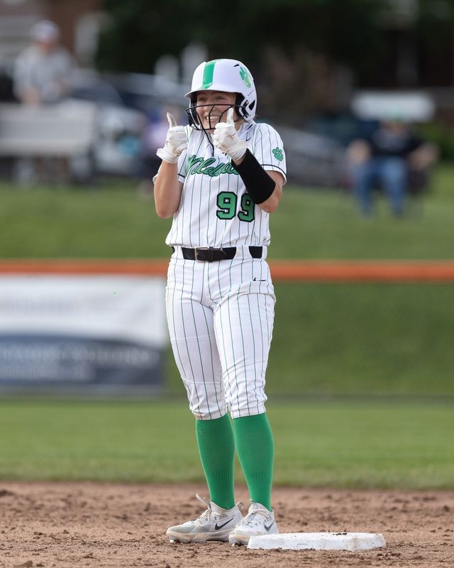 Mogadore’s Jayden Miller celebrates her teammate’s hit during Thursday’s Division IV district championship game against Southern in Dalton, OH.