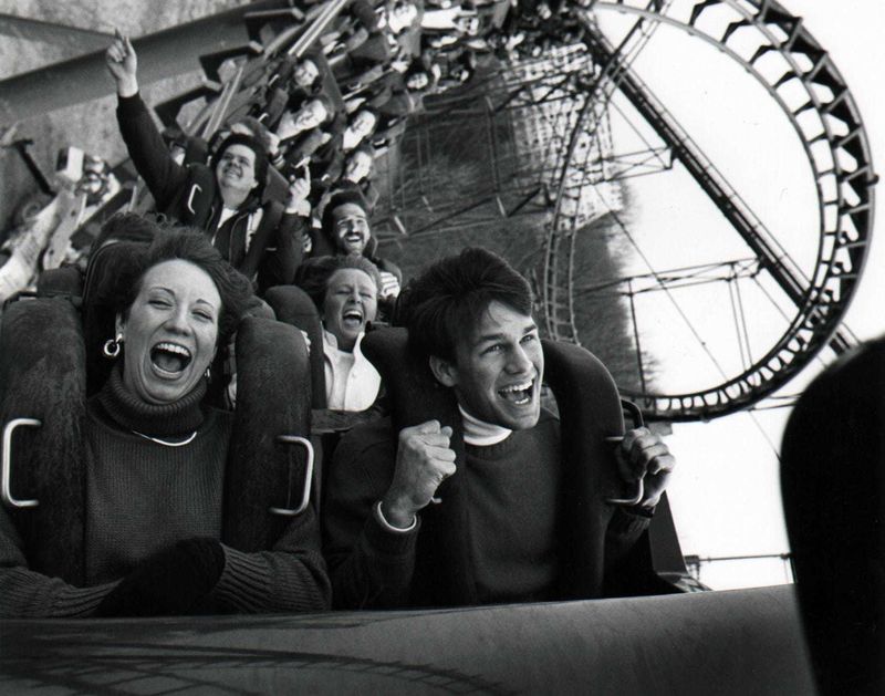 1988: The first riders on Kings Island's new steel roller coaster, Vortex, are exuberant here as they come out of the corkscrew turn. All of the riders are employees of the park. Vortex will open Saturday, April 11, 1988.