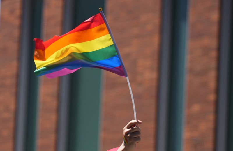 Jun 15, 2024; Columbus, Ohio, USA; A pride flag is waved during the annual Stonewall Pride March through downtown Columbus and the Short North June 15, 2024. The theme for this year’s celebrations is “Live out Loud,” and it marks the 43rd year of Stonewall Columbus hosting citywide Pride celebrations