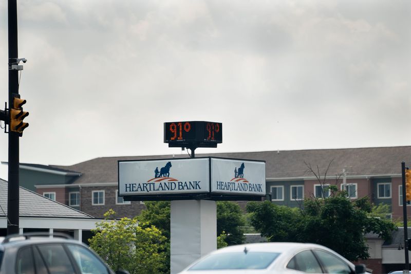 Jun 17, 2024; Columbus, Ohio, USA; A bank board reads 91 degrees at noon on Monday. The National Weather Service in Wilmington issued a heat advisory across central Ohio through the coming week for what it described as "dangerously hot conditions."