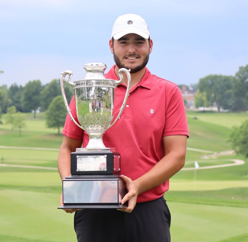 Drew Salyers holds the trophy after winning the 103rd Ohio Open championship on the South Course of Westfield Country Club, Wednesday, July 3, 2024.