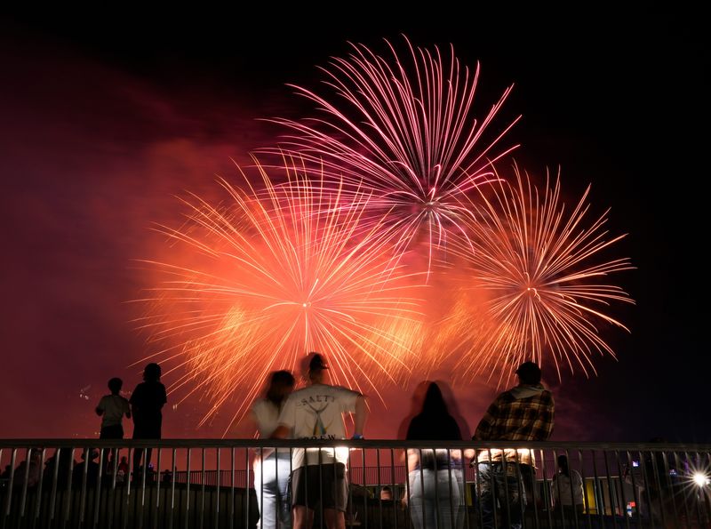 Guests enjoy fireworks during Red, White & BOOM! in 2024 in downtown Columbus from the National Veterans Memorial and Museum.