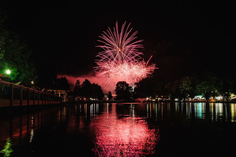 Fireworks explode during the 2024 First Town Days Festival in New Philadelphia’s Tuscora Park. This year's fireworks display, held in conjunction with the First Town Days Festival, will begin at 10 p.m. at Tuscora Park. Parking will be limited, particularly near the Al Maloney Stage and Hillside due to proximity to the launch zone.