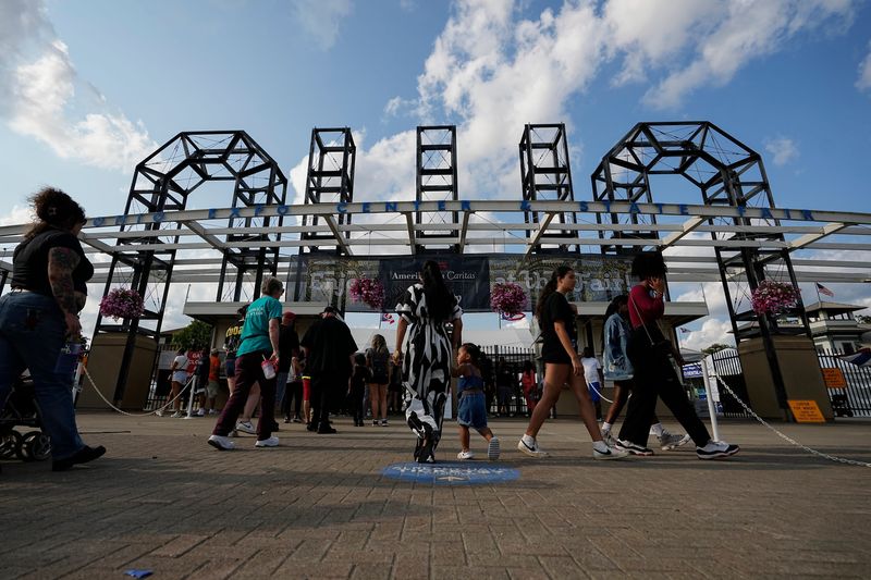 Jul 30, 2024; Columbus, Ohio, USA; Visitors line up to enter the Ohio State Fair through the iconic entryway on 11th Avenue.