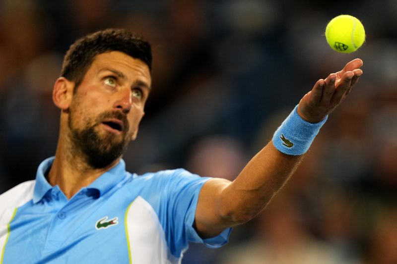 Novak Djokovic, of Serbia, serves to Gael Monfils, of France, during their third-round match of the Western & Southern Open tennis tournament, Thursday, Aug. 17, 2023, at the Lindner Family Tennis Center in Mason, Ohio.