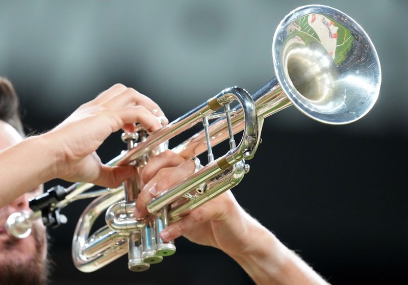 A member of the Spartans, of Nashua, N.H., performs during the Drum Corps International World Championship Prelims on Thursday, Aug. 8, 2024, at Lucas Oil Stadium in Indianapolis.