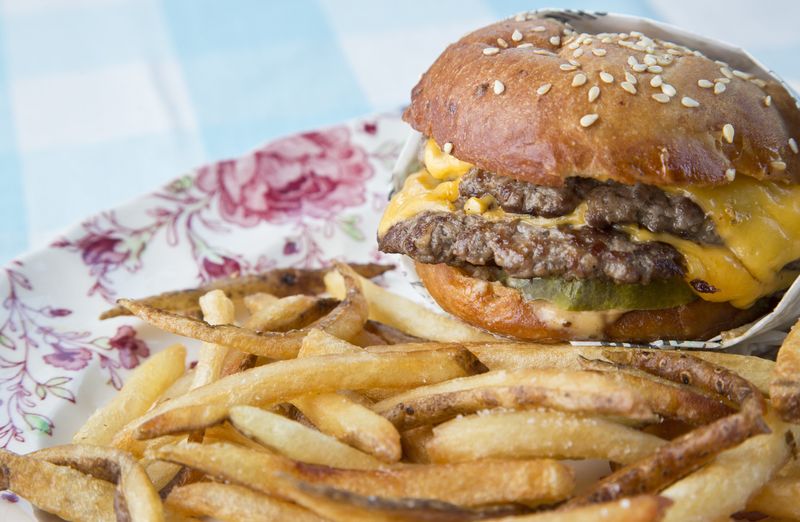 Chapman’s Burger (double) with fries at Chapman’s Eat Market photographed on Thursday, September 14, 2020. (Rob Hardin/Columbus Alive)