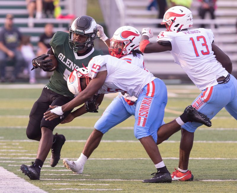 GlenOak's Javi'Ion McClendon runs the ball against Villa Angela-St. Joseph, Aug. 23, 2024.