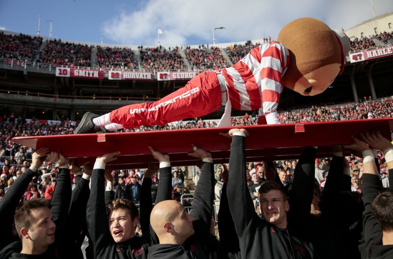 Brutus the Buckeye does push-ups as Ohio State ROTC members hold him up during the fourth quarter of a NCAA college football game between the Ohio State Buckeyes and the Nebraska Cornhuskers on Nov. 3, 2018, at Ohio Stadium in Columbus, Ohio.