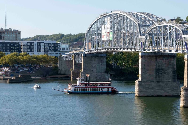 Queen City Riverboats passes under the Purple People Bridge.