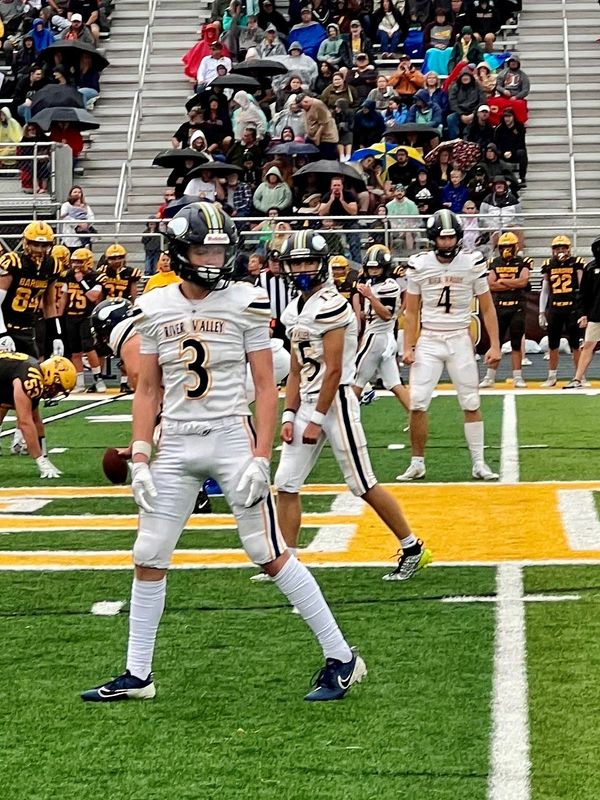 River Valley's Eli Snyder (3) checks the sideline for a signal as a receiver during a football game at Buckeye Valley last year.
