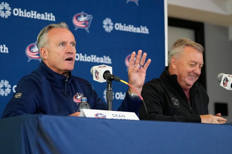 Sep 18, 2024; Columbus, Ohio, USA; Columbus Blue Jackets general manager Don Waddell, right, and head coach Dean Evason talk to reporters during a press conference for media day at Nationwide Arena. The Blue Jackets start training camp on Sept. 19.