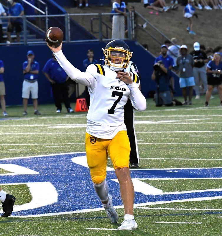 Moeller quarterback Matt Ponatoski, shown throwing a touchdown pass against St. Xavier last September, is the first athlete in Ohio history to win Gatorade Player of the year for baseball and football in the same year.