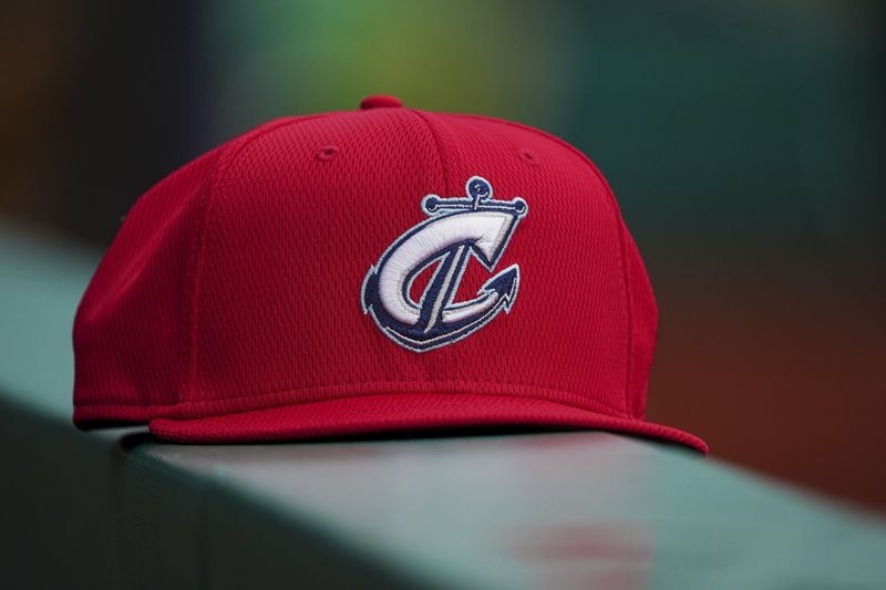 Mar 27, 2024; Columbus, Ohio, USA; A Columbus Clippers hat sits on the dugout railing during practice at Huntington Park.