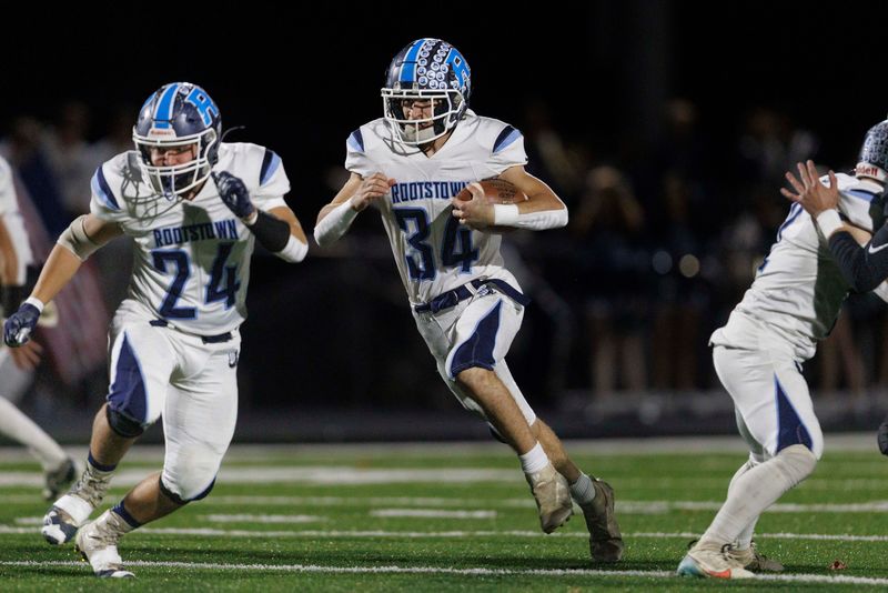 Rootstown running back Damien Reuting finds open field for yards against Mogadore on Oct. 25, 2024, in Mogadore.