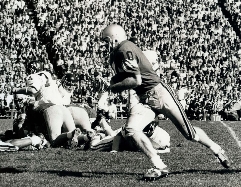 Ohio State quarterback Rex Kern scrambles against Northwestern in 1968.