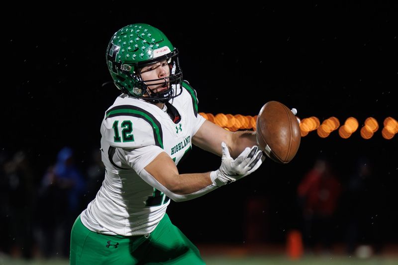 Highland tight end Evan Foust pulls in a catch during a Division II regional championship against Avon on Nov. 22, 2024, in Elyria.