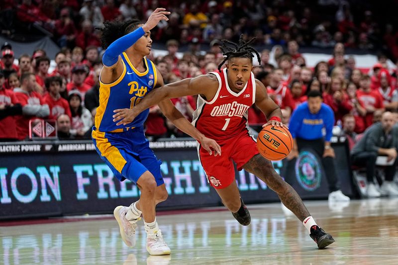 Ohio State Buckeyes guard Meechie Johnson Jr. (1) dribbles past Pittsburgh Panthers guard Jaland Lowe (15) during the second half of the NCAA men's basketball game at Value City Arena in Columbus on Friday, Nov. 29, 2024. Ohio State lost 91-90 on a last second shot in overtime.