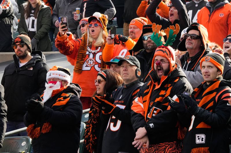 Bengals fans cheer prior to their game against the Browns at Paycor Stadium on Sunday December 22, 2024. Bengals lead the game at halftime with a score of 17-0.