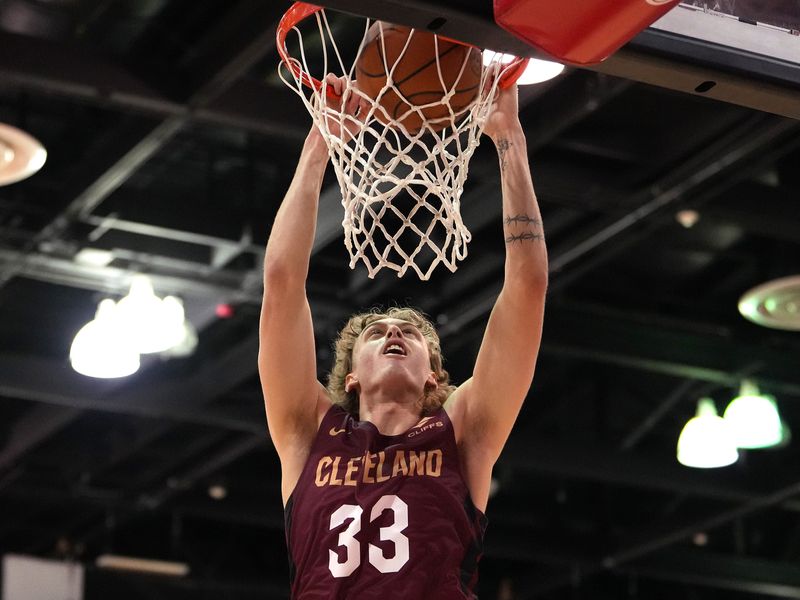 Jul 13, 2022; Las Vegas, NV, USA; Cleveland Cavaliers forward Luke Travers (33) dunks against the Charlotte Hornets during an NBA Summer League game at Cox Pavilion.
