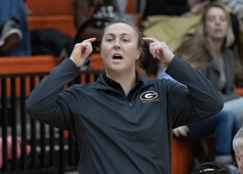 Green girls basketball coach Alicia Manning reacts during a game against Jackson on Jan. 15, 2025.