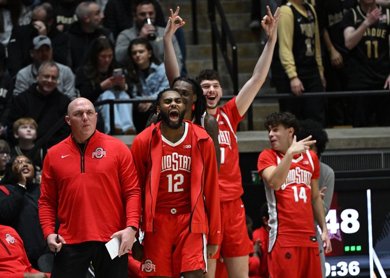 Jan 21, 2025; West Lafayette, Indiana, USA; Ohio State Buckeyes guard Evan Mahaffey (12) and the rest of the Ohio State Buckeyes bench react to a three point shot during the second half against the Purdue Boilermakers at Mackey Arena. Mandatory Credit: Marc Lebryk-Imagn Images