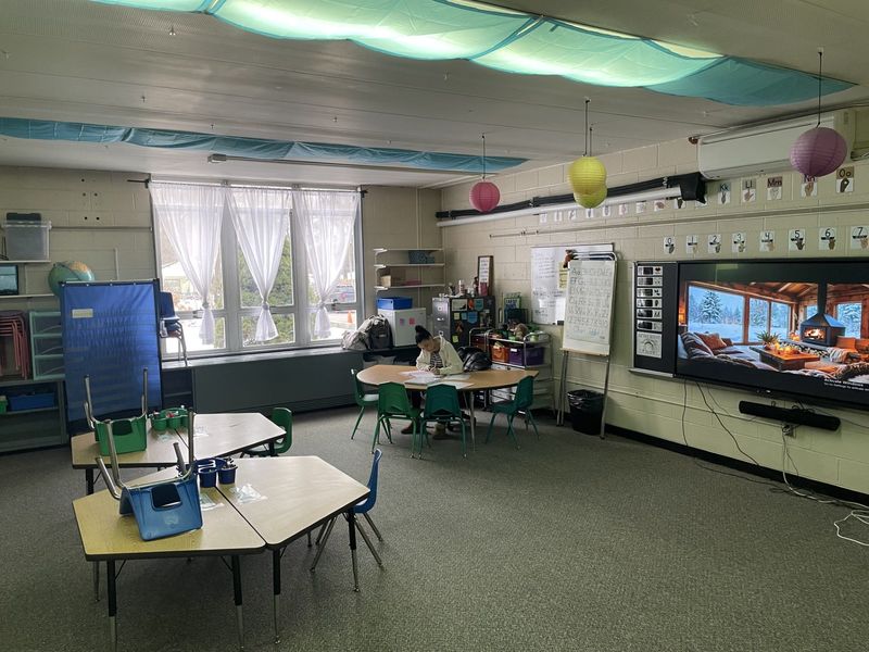 Alexis Kremer, a kindergarten teacher at West Park Elementary School in Ravenna, works on a lesson plan. The school will close next school year, with students and their teachers moved to Willyard Elementary School, which now houses first and second graders.