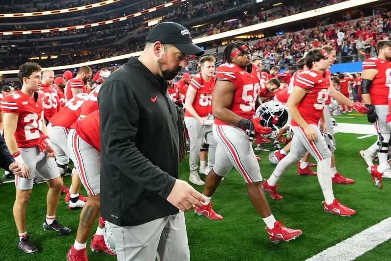 Dec 29, 2023; Arlington, Texas, USA; Ohio State Buckeyes head coach Ryan Day walks off the field following their 14-3 loss to the Missouri Tigers in the Goodyear Cotton Bowl Classic at AT&T Stadium.