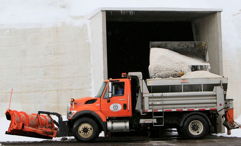 A city of Akron snow plow truck is filled with salt at the Triplett Blvd. city maintenance facility. This has been a record year for the City of Akron's snow removal crews clearing streets and sidewalks on Friday, Feb. 25 2011 in Akron, Ohio. (Paul Tople/Akron Beacon Journal)