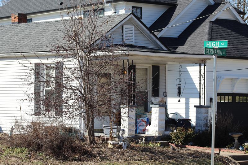 The house on Germania Street where 64-year-old Sheila Tenpenny was killed during a break-in. Police have arrested Tenpenny's teenage neighbor in connection with the killing.
