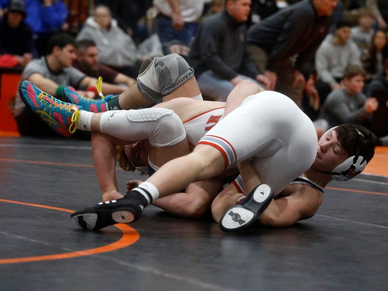 Morgan's Bradley Spencer wrestles Sheridan's Coltyn Reedy for first place at 157 pounds during the Muskingum Valley League Tournament on Saturday, Feb. 15, 2025, at New Lexington High School. Spencer will wrestle at Wheeling University this fall.