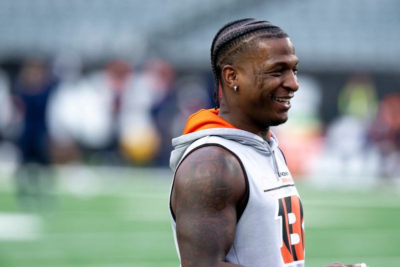 Cincinnati Bengals cornerback Mike Hilton (21) warms up before the NFL game between the Cincinnati Bengals and the Denver Broncos at Paycor Stadium in Cincinnati on Saturday, Dec. 28, 2024.