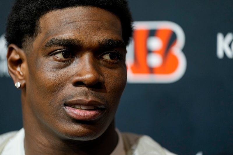 Cincinnati Bengals cornerback Cam Taylor-Britt (29) takes questions after practice at the Chicago Bears Halas Hall practice facility in Lake Forest, Ill., on Thursday, Aug. 15, 2024.