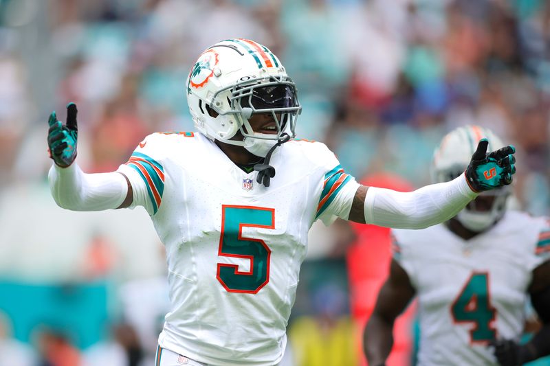 Oct 29, 2023; Miami Gardens, Florida, USA; Miami Dolphins cornerback Jalen Ramsey (5) reacts against the New England Patriots during the second quarter at Hard Rock Stadium. Mandatory Credit: Sam Navarro-USA TODAY Sports