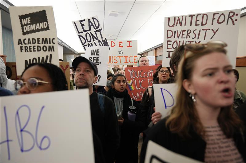Students and staff at the University of Cincinnati gather ahead of UC's Board of Trustees meeting on Tuesday, Feb. 25, 2025. The protests come after the university announced it was evaluating DEI initiatives.