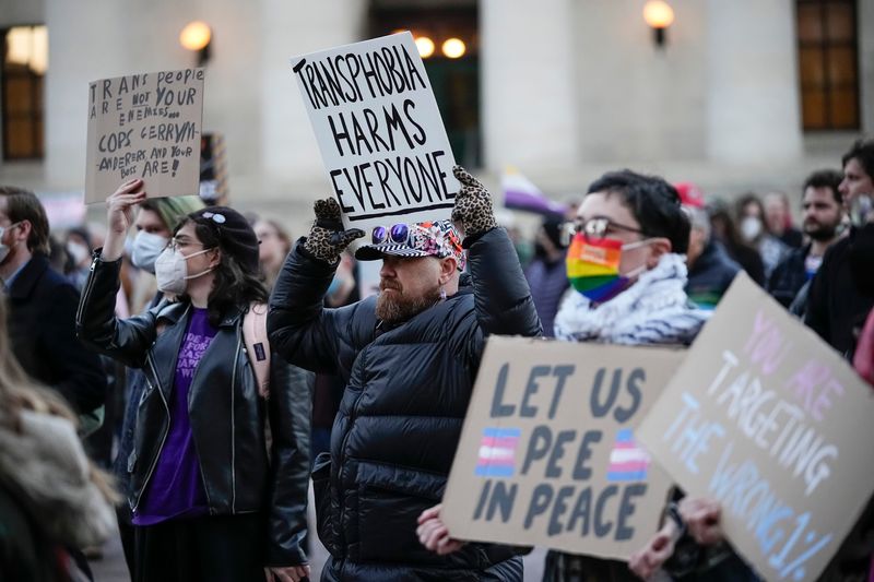 Transgender activists, advocacy groups and allies gather at the Ohio Statehouse to protest Ohio's new transgender bathroom bill on Feb. 25, 2025.