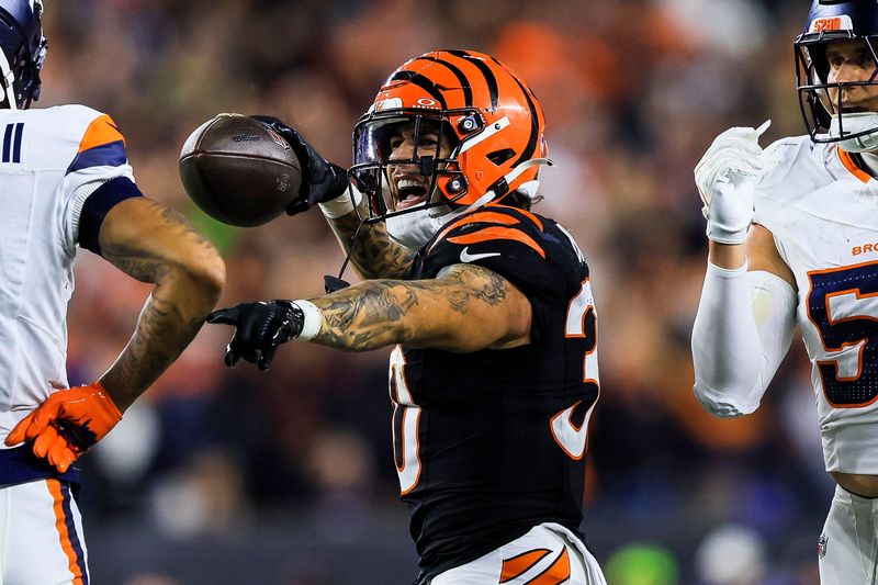 Dec 28, 2024; Cincinnati, Ohio, USA; Cincinnati Bengals running back Chase Brown (30) reacts after advancing the ball against the Denver Broncos in the second half at Paycor Stadium. Mandatory Credit: Katie Stratman-Imagn Images