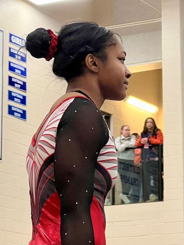 Marion Harding freshman Divine Reynolds competed in the all-around at Sunday's state gymnastics competition in Hilliard. She won the balance beam championship, was third on the vault and seventh in the all around to make All-Ohio in each