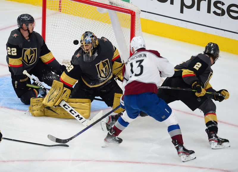 Jun 10, 2021; Las Vegas, Nevada, USA; Vegas Golden Knights defenseman Nick Holden (22) helps goaltender Marc-Andre Fleury (29) defend the goal against Colorado Avalanche right wing Valeri Nichushkin (13) during the third period in game six of the second round of the 2021 Stanley Cup Playoffs at T-Mobile Arena. Mandatory Credit: Gary A. Vasquez-USA TODAY Sports