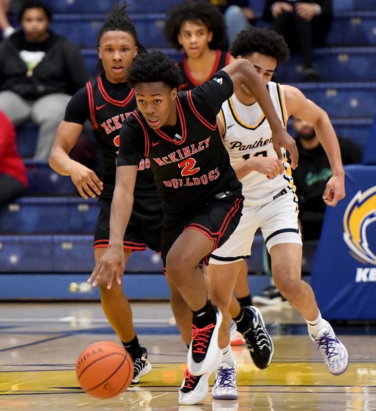 McKinley junior Anthony Chavers drives to the basket in the second quarter against Toledo Whitmer in a Division I regional semifinal, Tuesday, March 4, 2025, at Kent State.