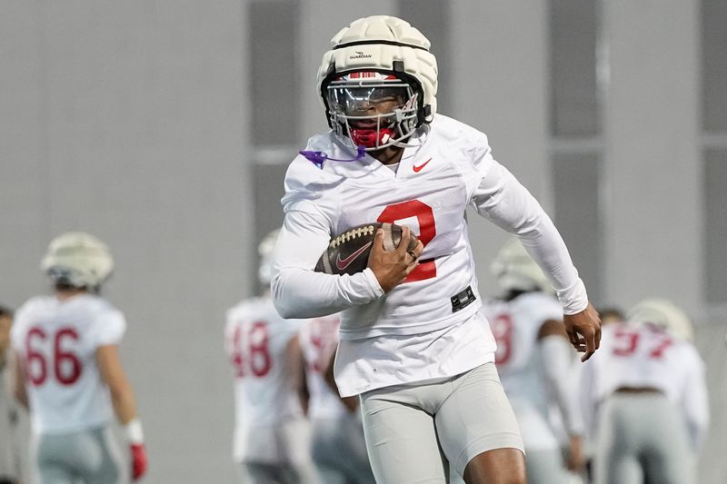 Ohio State Buckeyes safety Caleb Downs (2) fields a punt during spring football practice at the Woody Hayes Athletic Center on March 17, 2025.