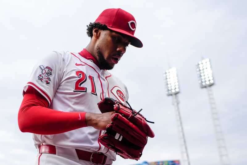 Cincinnati Reds pitcher Hunter Greene (21) returns to the dugout in the second inning of the MLB Opening Day game between the Cincinnati Reds and the San Francisco Giants at Great American Ball Park in downtown Cincinnati on Thursday, March 27, 2025. The Reds led 3-0 after three innings.