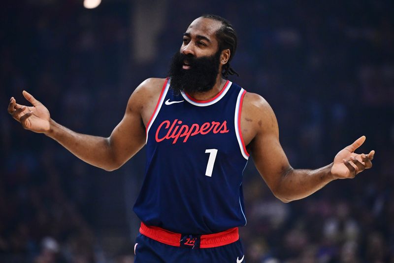 Mar 30, 2025; Cleveland, Ohio, USA; Los Angeles Clippers guard James Harden (1) argues a call with referee Curtis Blair (not pictured) during the first quarter against the Cleveland Cavaliers at Rocket Arena. Mandatory Credit: Ken Blaze-Imagn Images